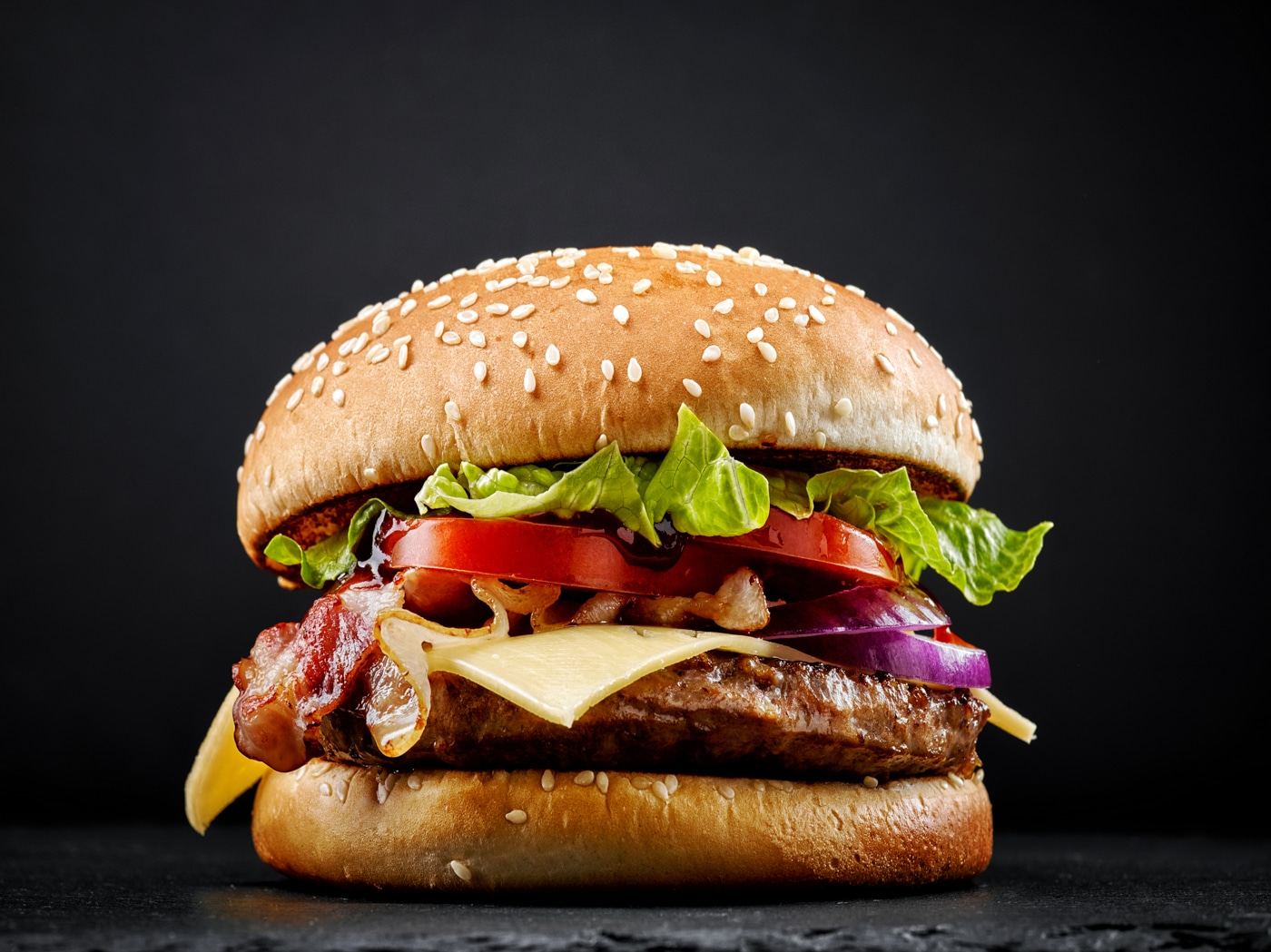Cheeseburger with bacon, lettuce and tomato from Wendy's inside Jack's